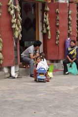 Shop keepers with dried Saussurea medusa et al., in Chinglish known as snow lotus