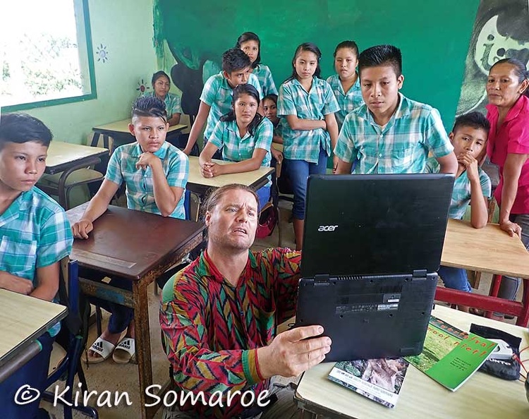 Daniel showing mushroom pictures in class DW Ms.jpg